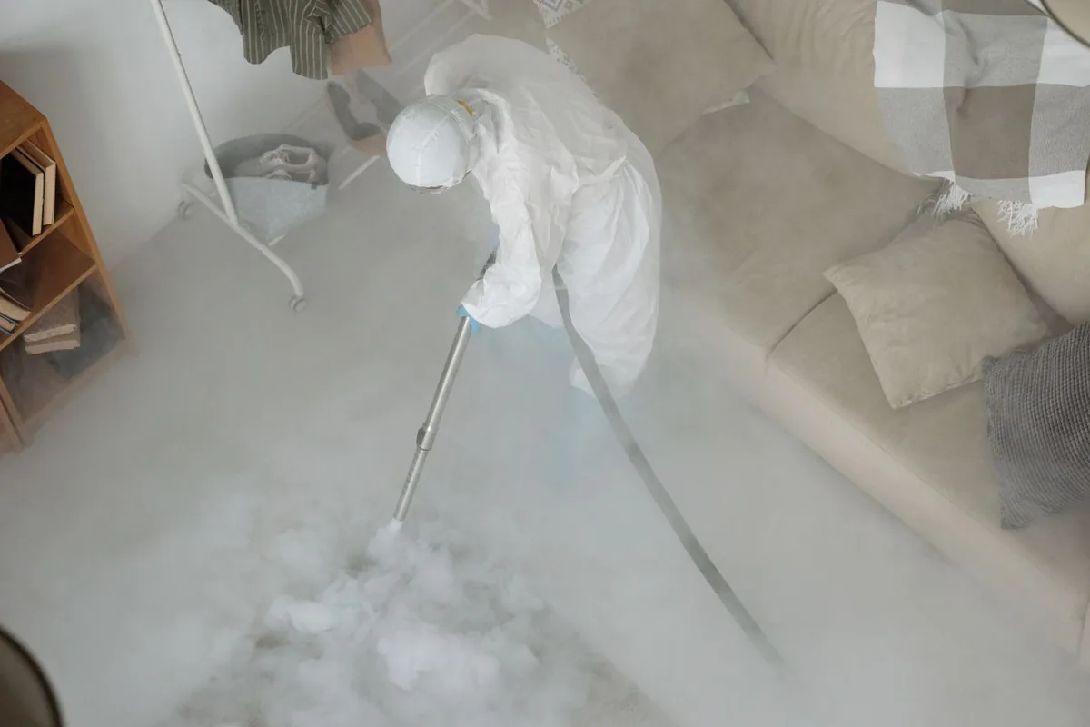 Biohazard cleanup technician in protective equipment, McConnellsburg, PA